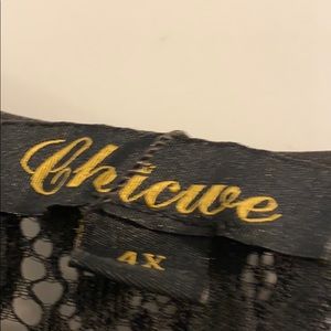 Black dress says 4x runs small. More like 2x